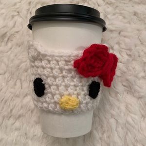 Handmade knitted Hello Kitty coffee sleeve